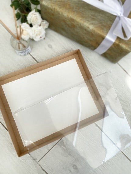 Универсальная коробка с прозрачной крышкой 26х21х3 см., крафт